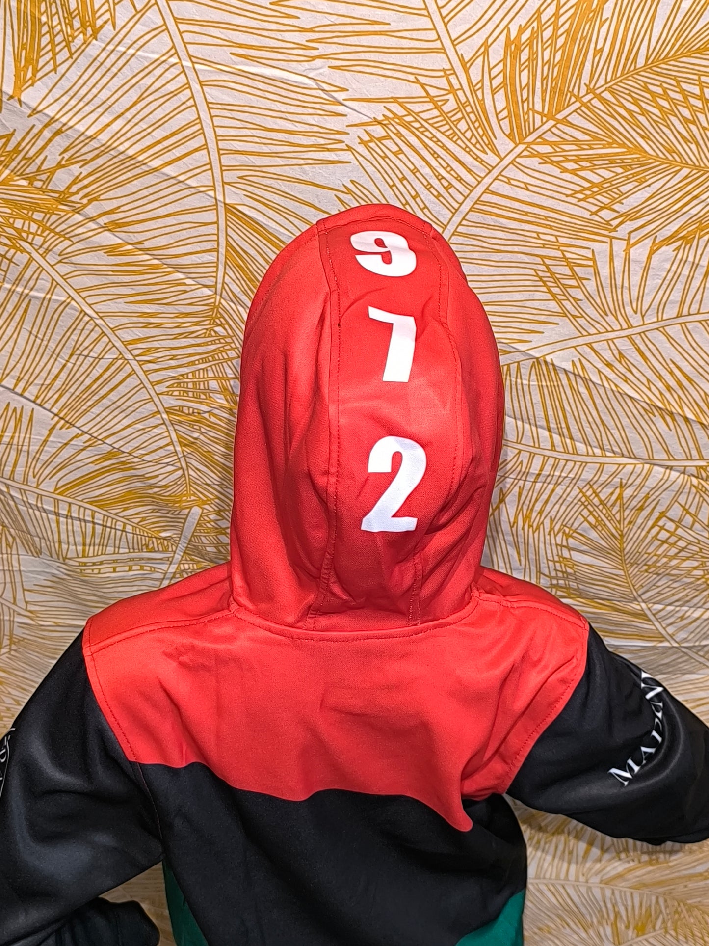 survêtement à capuche enfant martinique rouge vert noir